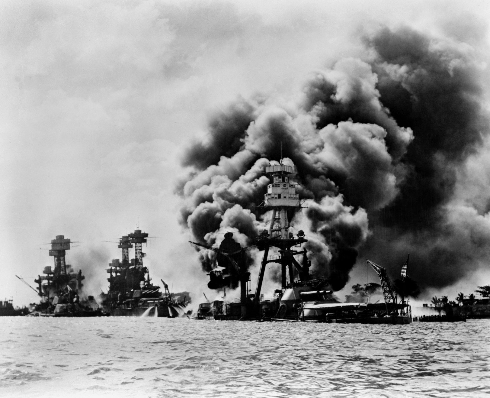Pearl Harbor: three stricken U.S. battleships.