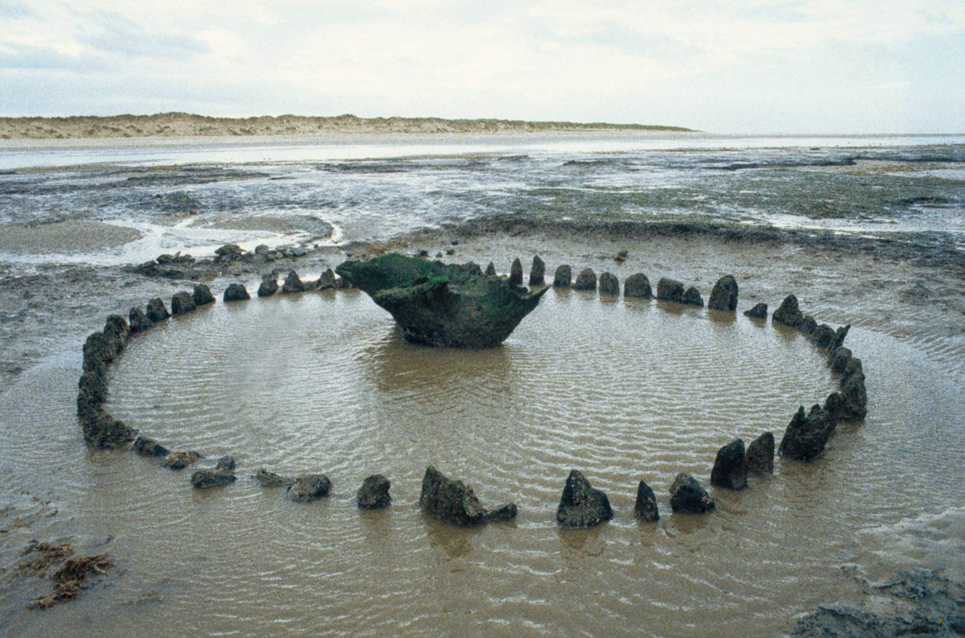 Seahenge, a unique wooden monument discovered off the coast of Norfolk, UK,