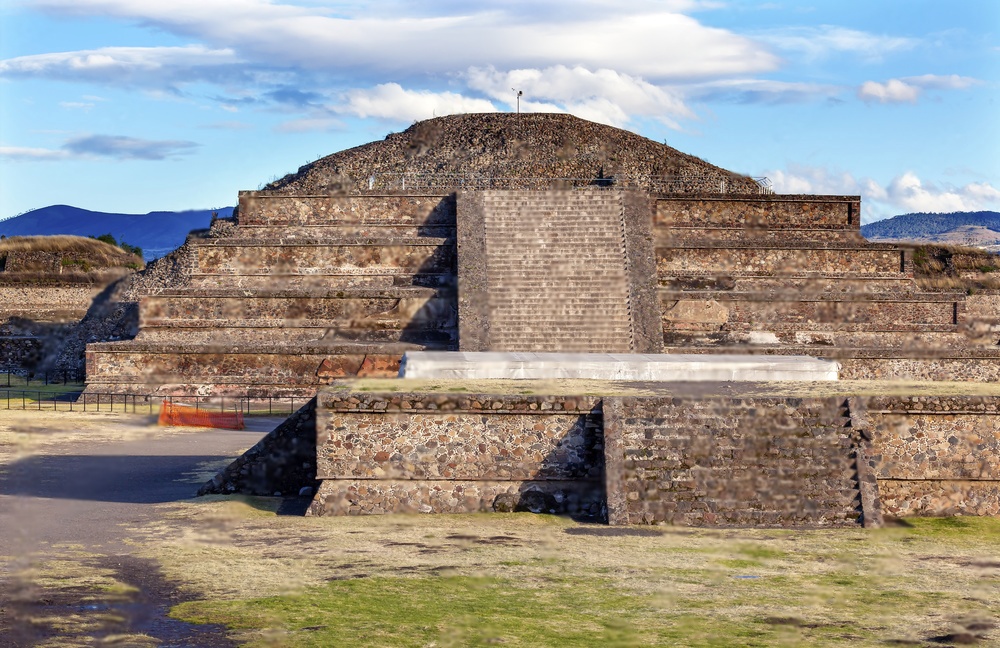 Temple of Quetzalcoatl also known as the Pyramid of the Feathered Serpent Pyramid in Teotihuacan, Mexico. Image Credit: Adobe Stock